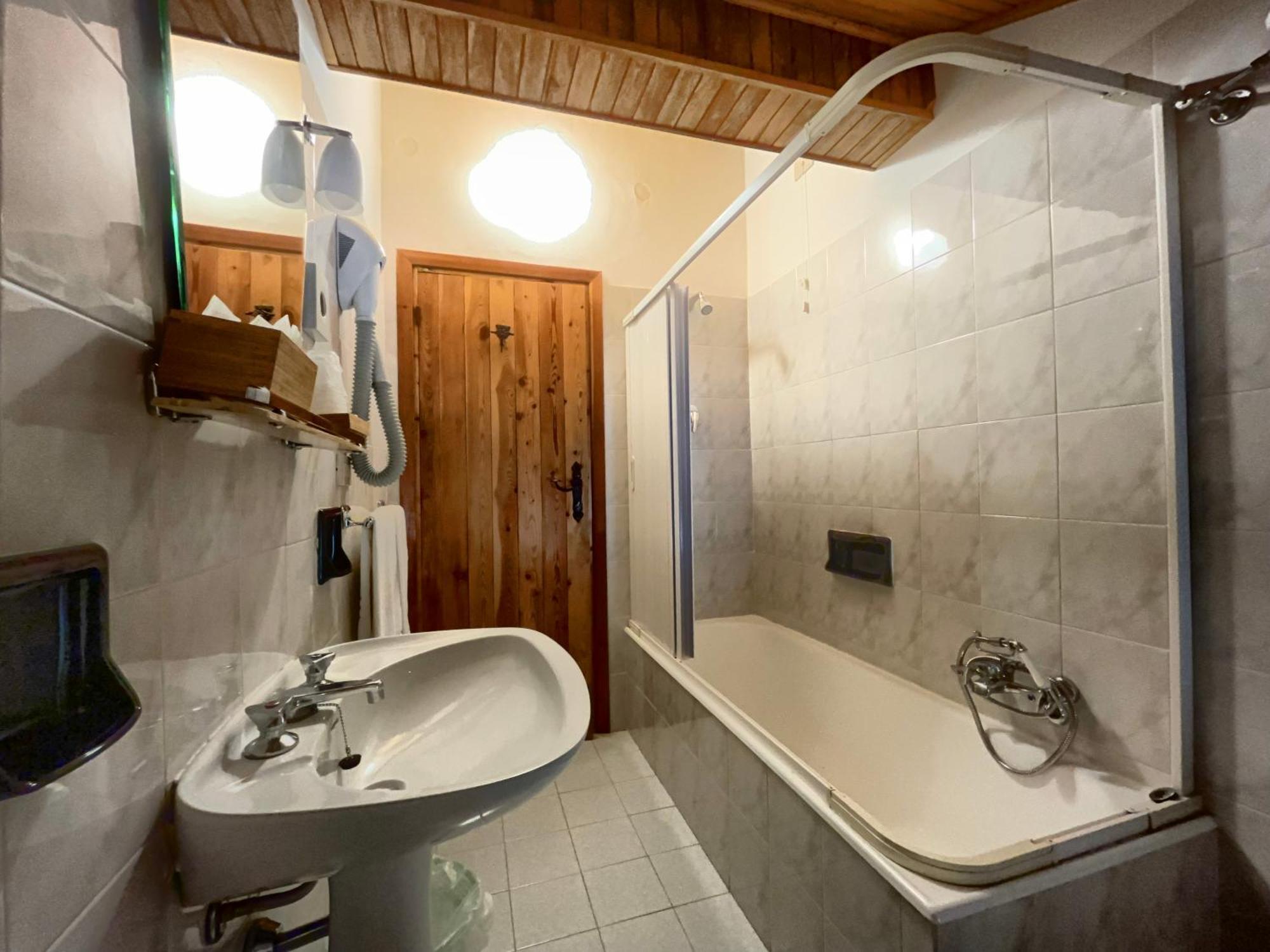 Hotel Garni Mille Pini สกันโน ภายนอก รูปภาพ